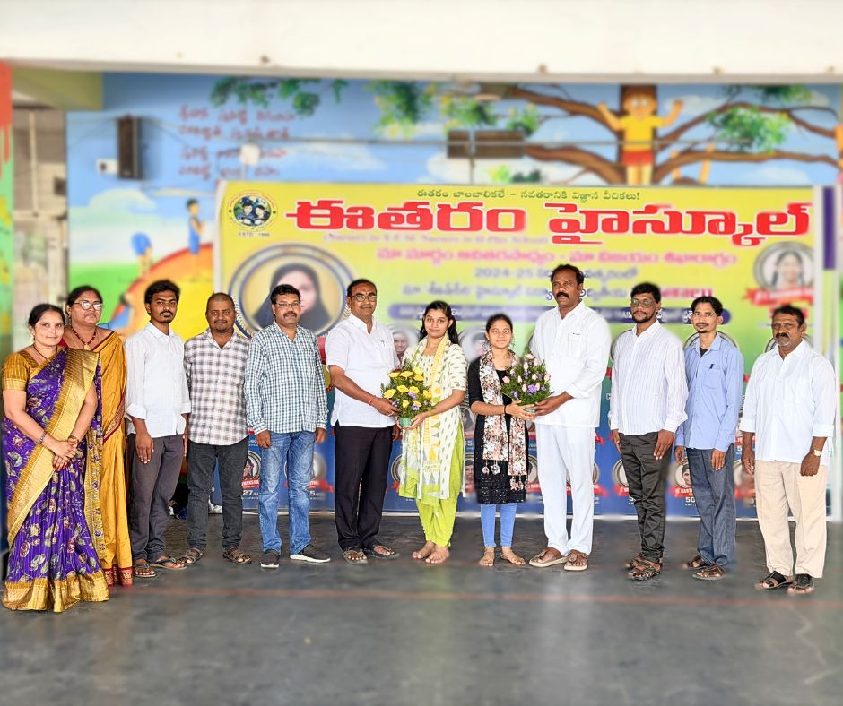 Staff and toppers at felicitation ceremony